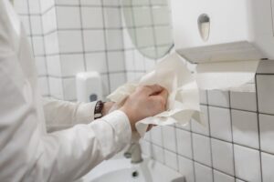 office-worker-take-paper-towel-after-washing-his-hands-cm