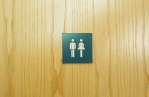 Male and female toilet sign on door -cm