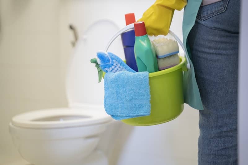 An Asian Young Woman Cleaning Restroom -cm